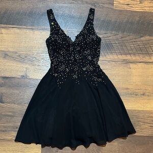 Elegant Black Embellished Dress with Mesh Back